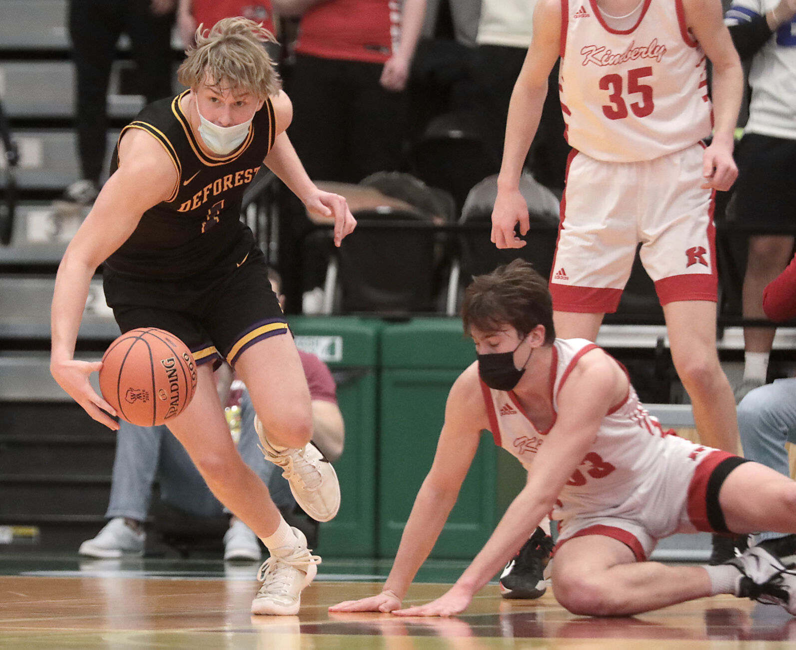WIAA state boys basketball photo: DeForest's Nolan Hawk goes on the run